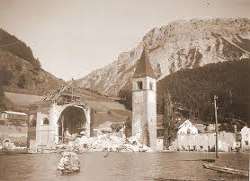 The only thing visible today is the campanile or t The only thing visible today is the campanile or the tower of Graun's 14th century church tower. Below the water of the lake, lie the remains of a cit